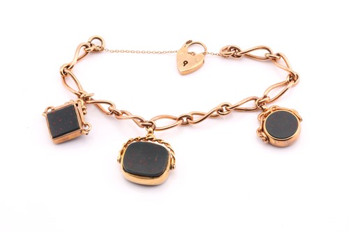 Lot 109 - A 9carat gold fancy twisted link charm...