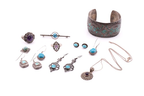 Lot 171 - A white metal cuff bangle set with mosaic...