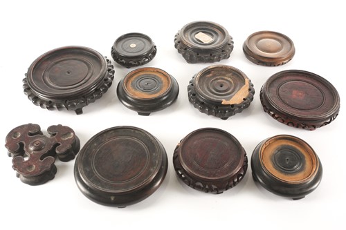 Lot 218 - A collection of Chinese carved wood vase...