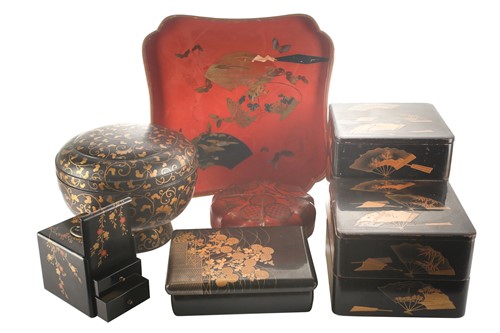 Lot 97 - A small collection of Japanese lacquered boxes,...