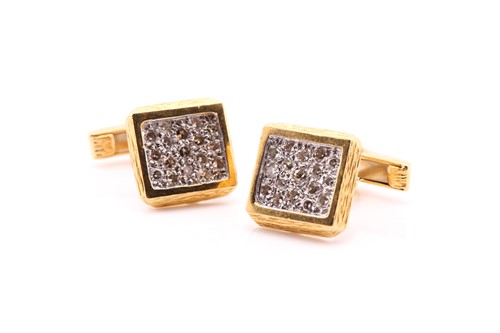 Lot 243 - A pair of 18 carat gold and diamond cufflinks;...