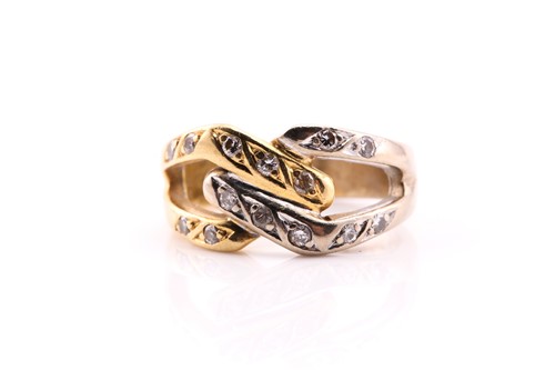 Lot 461 - An 18ct cross over ring, in yellow and white...