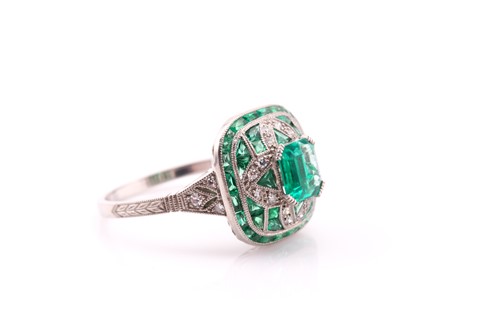 Lot 125 - An Art Deco style emerald and diamond ring,...