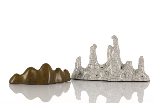 Lot 153 - Two Chinese mountain form brush rests, with...