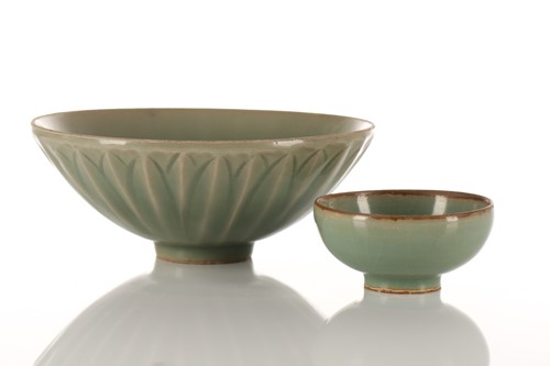 Lot 102 - A Chinese Longquan celadon bowl, the exterior...