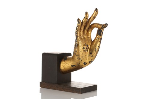 Lot 235 - A Thai gilt metal Buddha hand, modelled in...