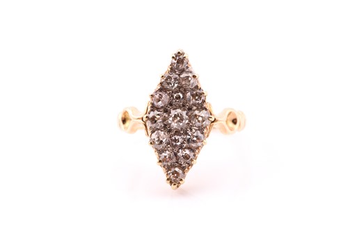 Lot 206 - An Edwardian yellow metal stamped 18ct diamond...