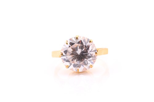 Lot 219 - A single stone ring, consisting of a round...