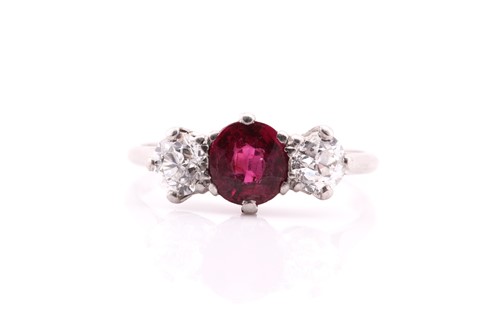 Lot 154 - A three-stone ring on white metal, consisting...