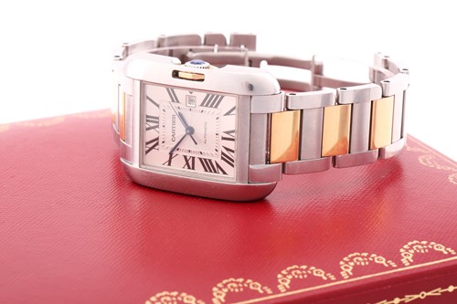 Lot 422 - An 18ct gold and steel Cartier Tank Anglais...