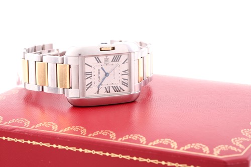 Lot 422 - An 18ct gold and steel Cartier Tank Anglais...