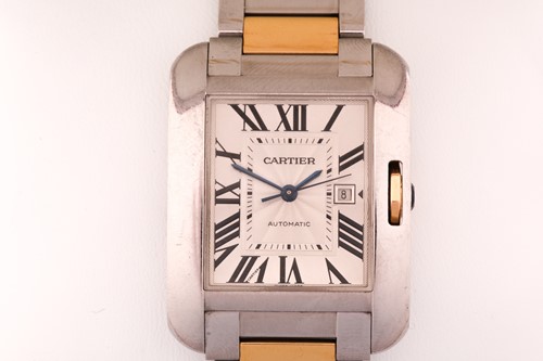 Lot 422 - An 18ct gold and steel Cartier Tank Anglais...