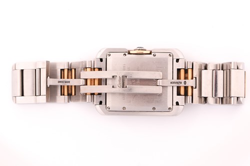 Lot 422 - An 18ct gold and steel Cartier Tank Anglais...
