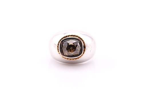 Lot 30 - A single stone brown diamond ring, the cushion...