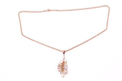 Lot 86 - A moonstone cabochon tassel pendant, on...
