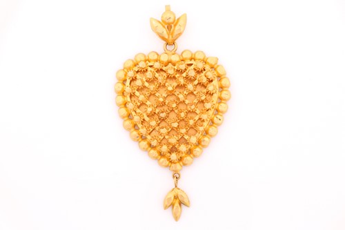Lot 76 - A Middle Eastern yellow metal heart-shaped...