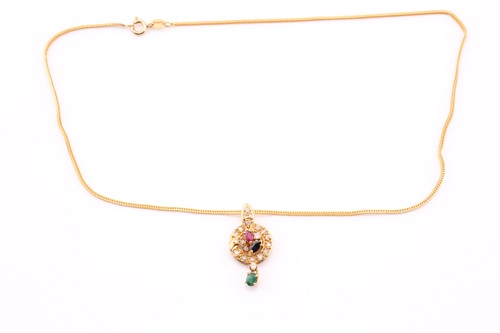 Lot 120 - A sapphire, ruby, emerald and diamond pendant...