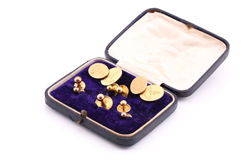 Lot 187 - A pair of yellow precious metal oval double...
