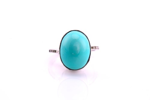 Lot 49 - A turquoise and diamond ring, the oval...