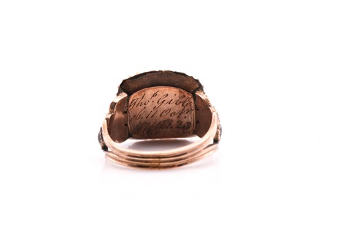 Lot 311 - A Georgian stone set mourning ring consisting...