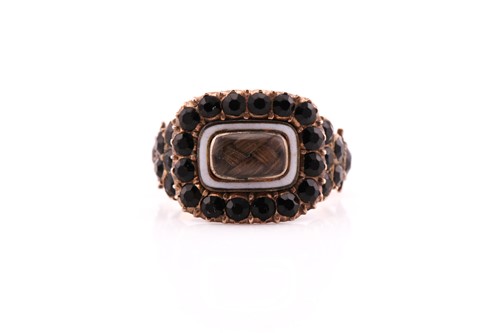 Lot 311 - A Georgian stone set mourning ring consisting...