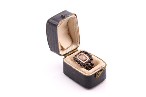 Lot 311 - A Georgian stone set mourning ring consisting...