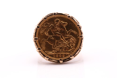 Lot 322 - An Edward VII sovereign mounted in an ornate...