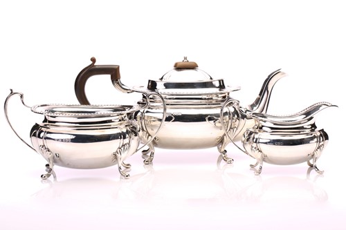 Lot 615 - A 20th-century silver three-piece tea set....