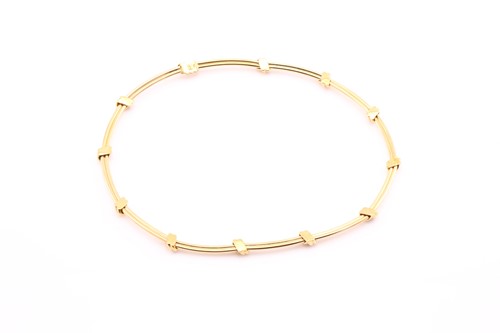 Lot 30 - A Mappin and Webb 18ct yellow gold articulated...