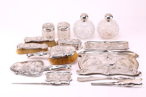 Lot 574 - An Art Nouveau silver backed dressing table...