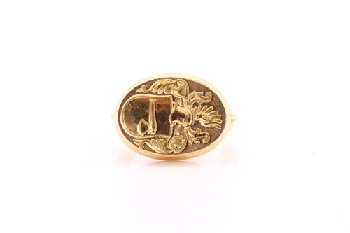 Lot 312 - An 18ct gold signet ring, the oval 1.8 x...