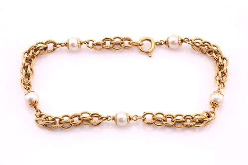 Lot 92 - A fancy round link and cultured pearl bracelet,...