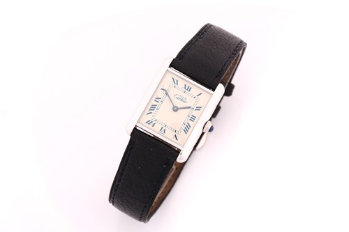 Lot 543 - A silver Cartier Tank ladies wristwatch with a...