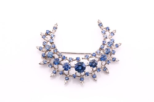 Lot 413 - A sapphire and diamond crescent shape brooch,...