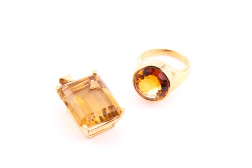 Lot 104 - A citrine pendant, the rectangular step-cut...