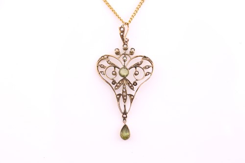Lot 63 - An Edwardian peridot and seed pearl openwork...