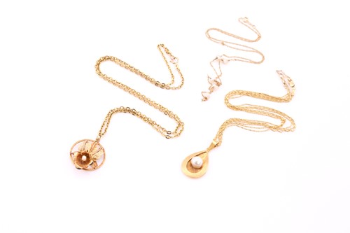Lot 95 - Three necklaces, comprising of a triple strand...