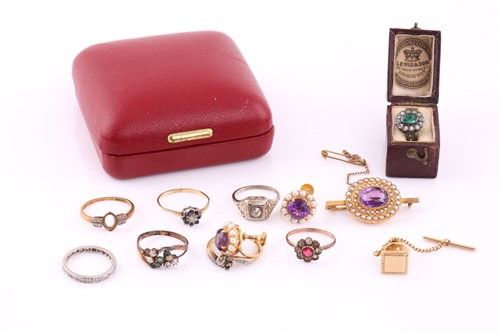 Lot 281 - An amethyst and seed pearl brooch; the oval...