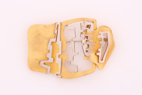 Lot 32 - A bi-coloured abstract form brooch; the...