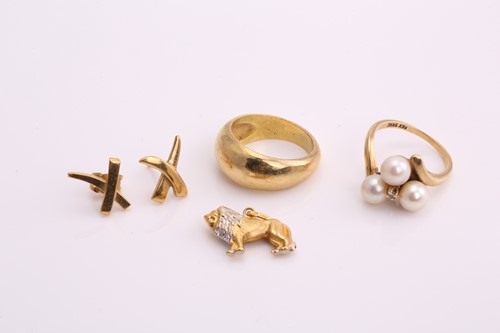 Lot 429 - A wide, tapering yellow metal ring; of curved,...
