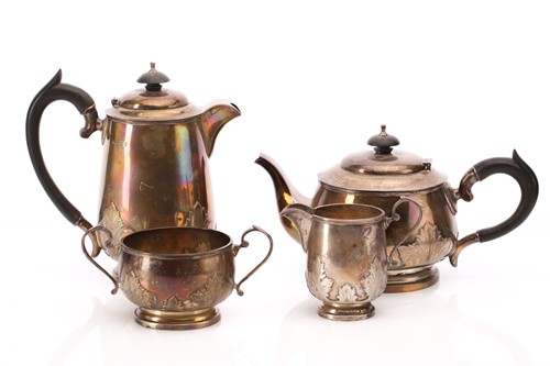 Lot 575 - A silver four piece tea set, Walker & Hall,...