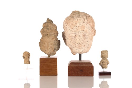 Lot 338 - A Gandharan stucco head of Buddha, 2/3AD,...
