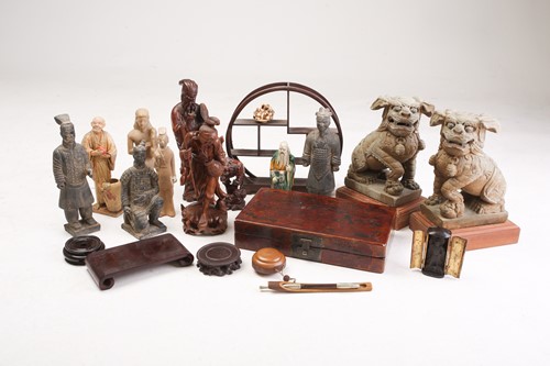Lot 132 - A pair of composition temple lions, 20th...