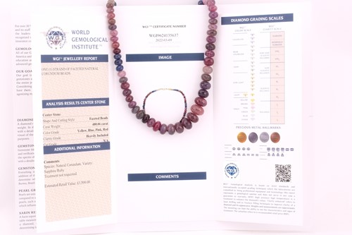 Lot 50 - A sapphire and ruby faceted bead necklace, the...
