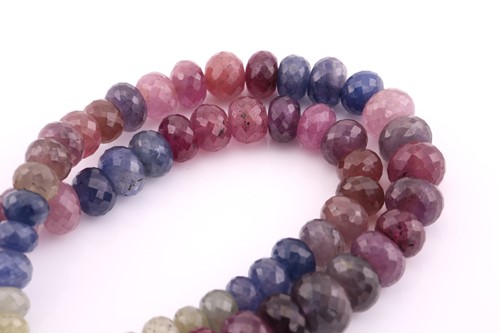 Lot 50 - A sapphire and ruby faceted bead necklace, the...