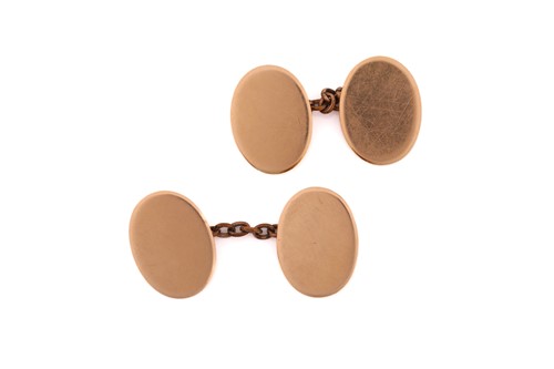 Lot 57 - A pair of 15ct gold oval cufflinks, each...