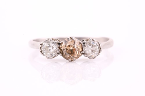 Lot 366 - A three-stone diamond ring, consisting of an...