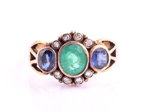 Lot 7 - An Emerald and Sapphire dress ring, consisting...