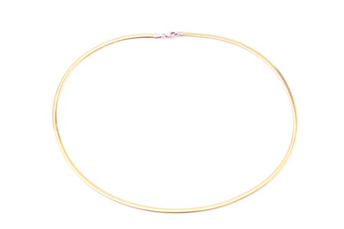 Lot 267 - An Aurafin bi-coloured flat snake chain...