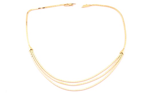 Lot 23 - A three-stranded yellow gold box link chain,...